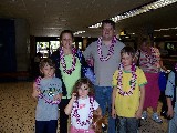 The whole family arriving in Hawaii