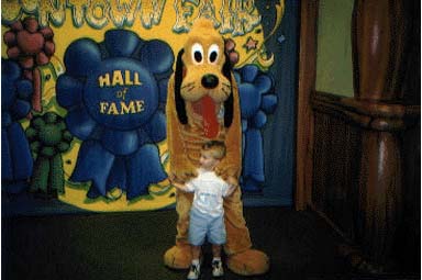 Jacob with Goofy, Disney land.