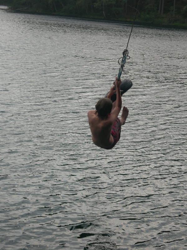 Jacob taking a plunge into the Balestjrn. This was a secluded lake in Northern Sweden. The tire was fun to jump from