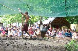 The mud wrestling show, one of the funniest shows at Scarborough Faire. It occurs in the evil mud pit