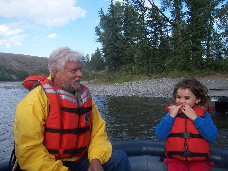 Rachel and Grandpa Stig slow rafting on Snake River in Grand Teton National Park.