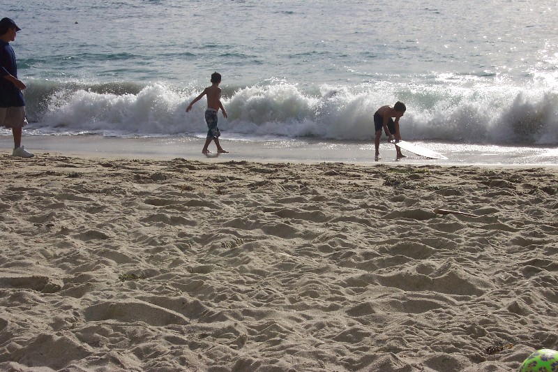Jacob tried to surf the waves at Laguna Beach