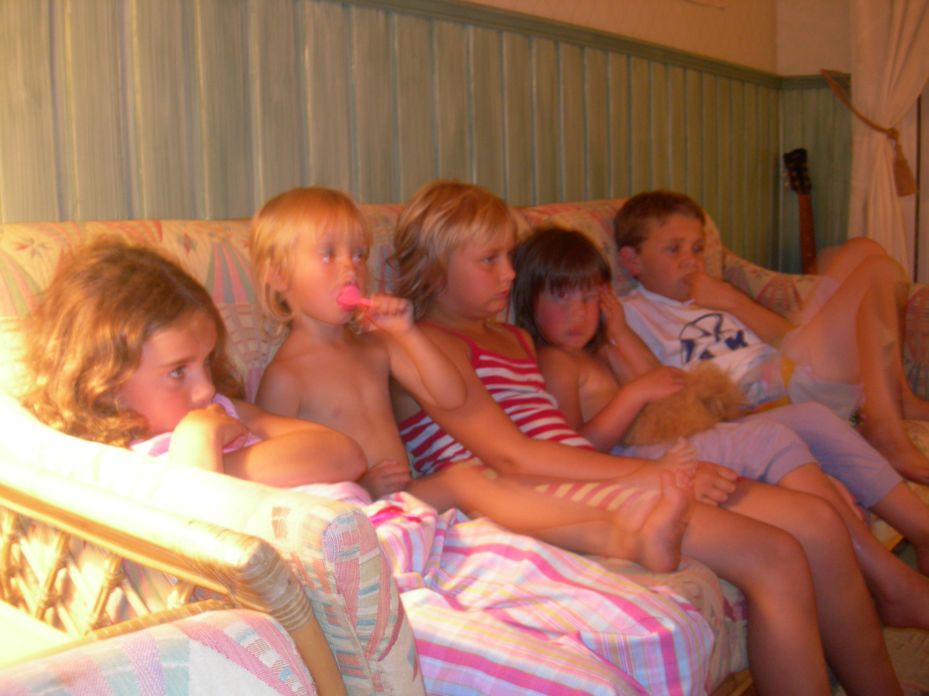 Cousins watching a movie