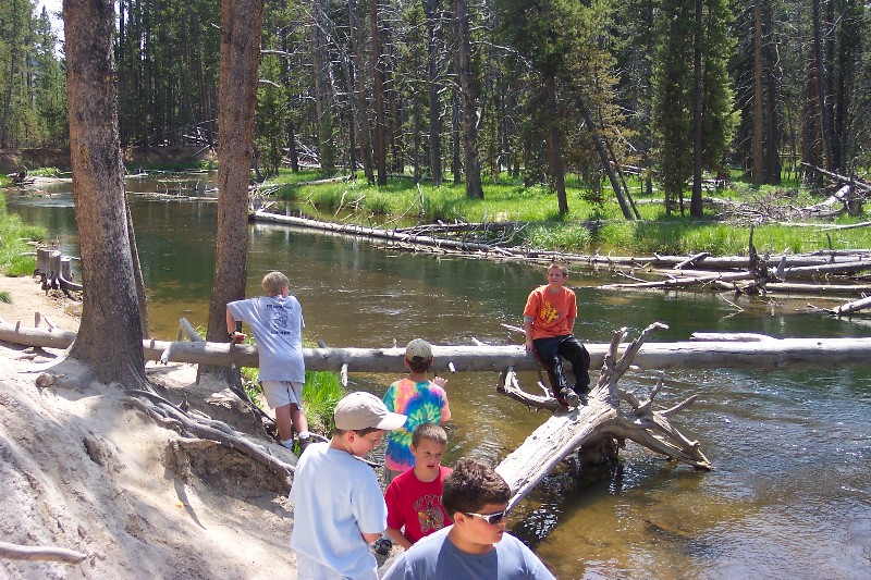 By a creek in Yellowstone, front to back, Harrison, Max, Jacob, William McGee, and Will. The boy with his back turned I don't know