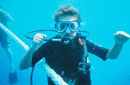 Jacob is Scuba Diving in the Great Barrier Reef. We saw lots of fish including barracudas and sharks