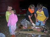 The kids caught lots of big rainbow trout, not it is time to prepare. Maria Wikman, Rachel Wikman, Jacob and Thomas