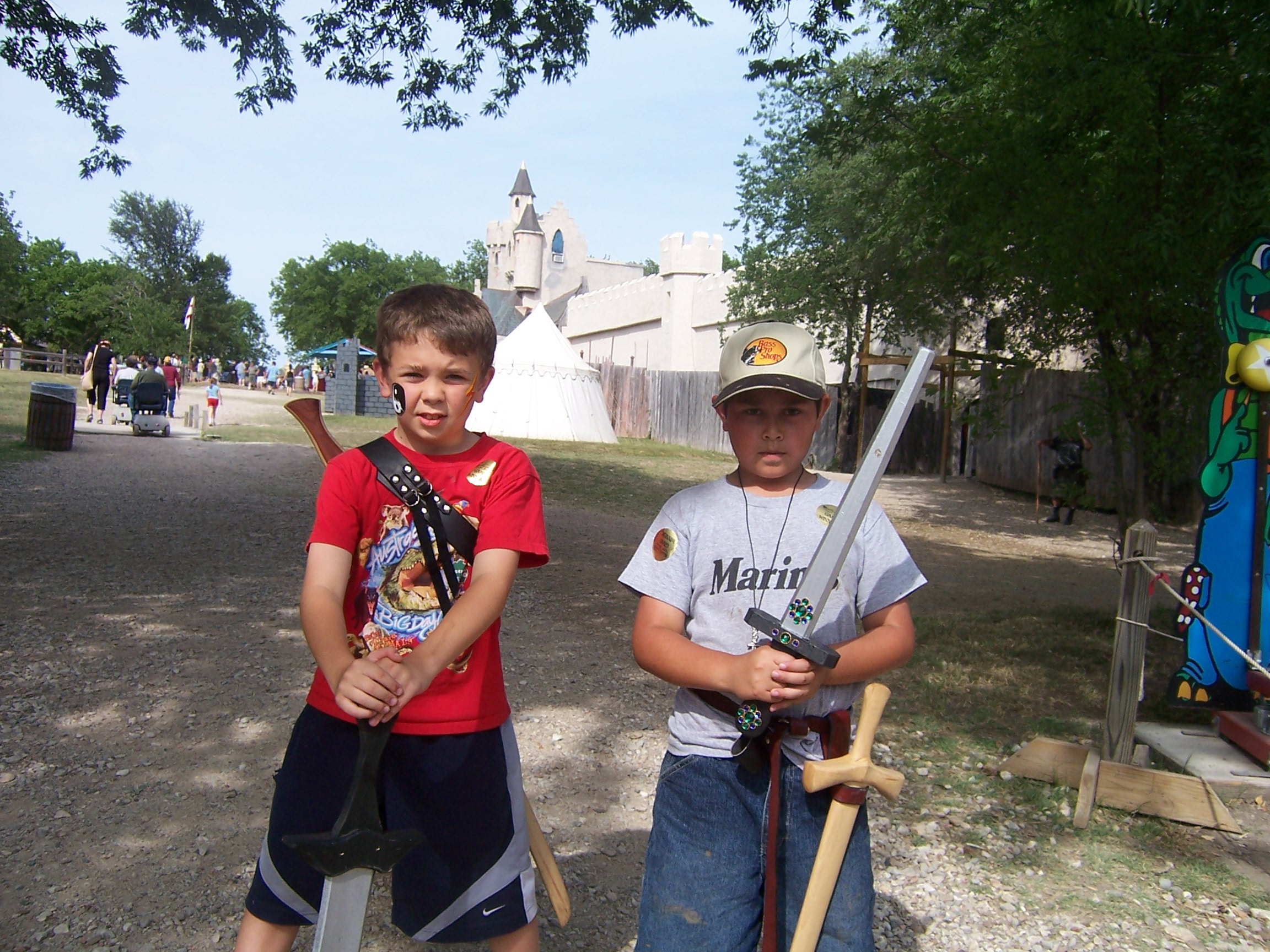 David and Jackson Sterling and their swords. Yorkshire Tower and Dungeon in the background