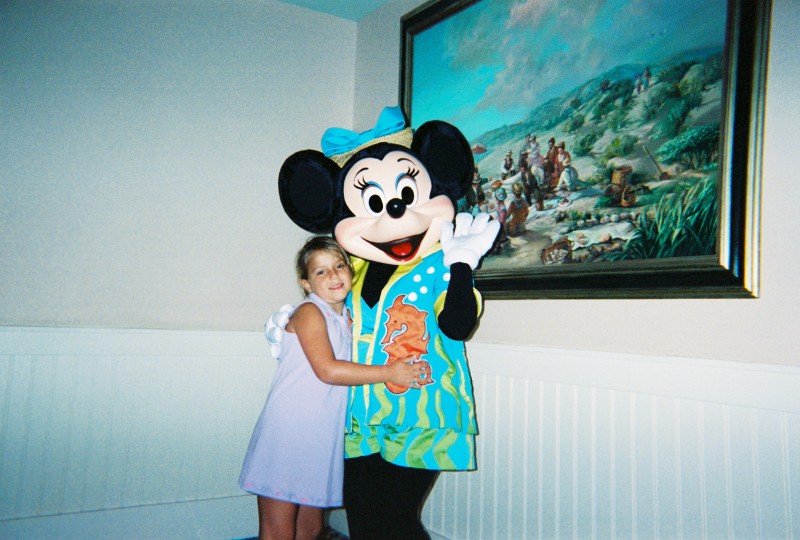 Minnie Mouse gives Sara Van Newkirk a hug