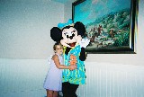 Minnie Mouse gives Sara Van Newkirk a hug