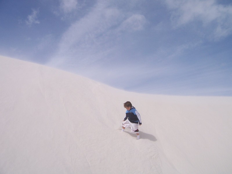 David is climbing a sand dune