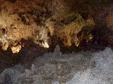Carlsbad Caverns contain a room which is the largest cave room in the world. It is half a kilometer wide, and 130 meters high