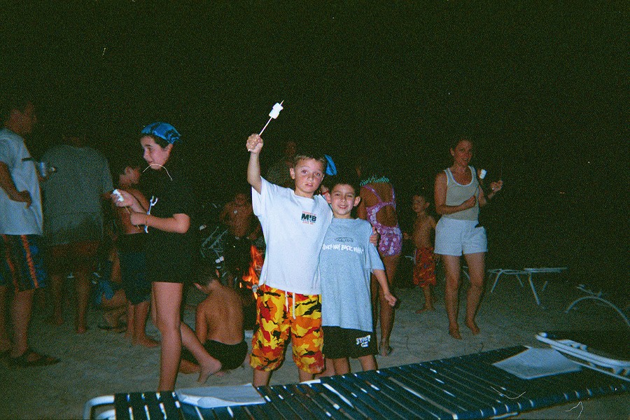 There is a Party on the Beach. Jacob and a friend