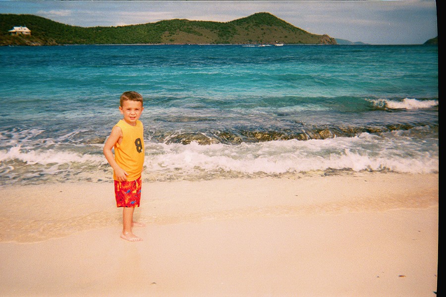 David on the Beach. Thatch Cay in the background