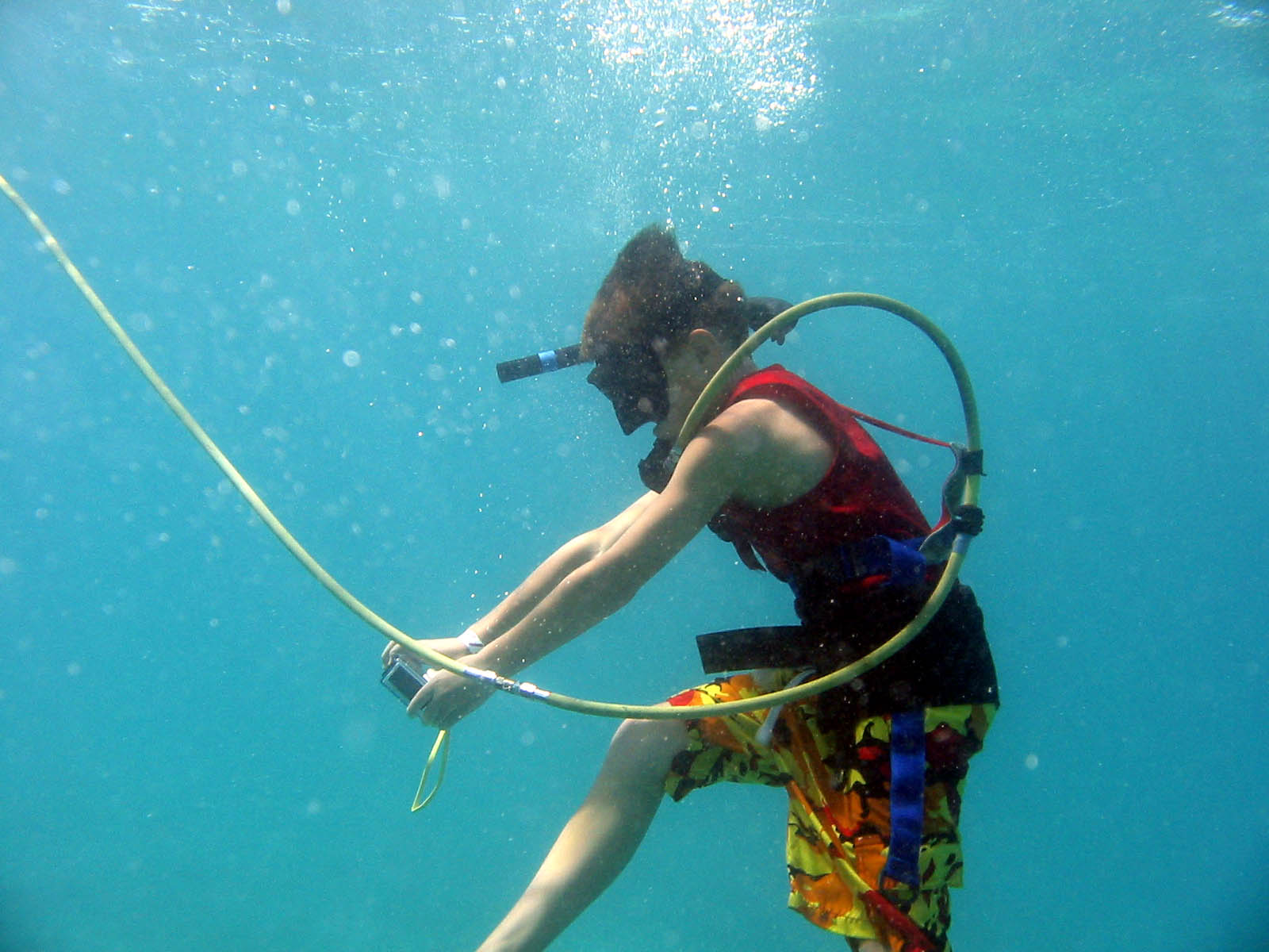 Jacob is taking an underwater photograph