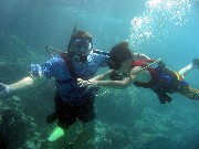 Jacob and I went Snuba diving. Snuba means that you go under water but you don't use a tank, you use a hose attached to a floating tank