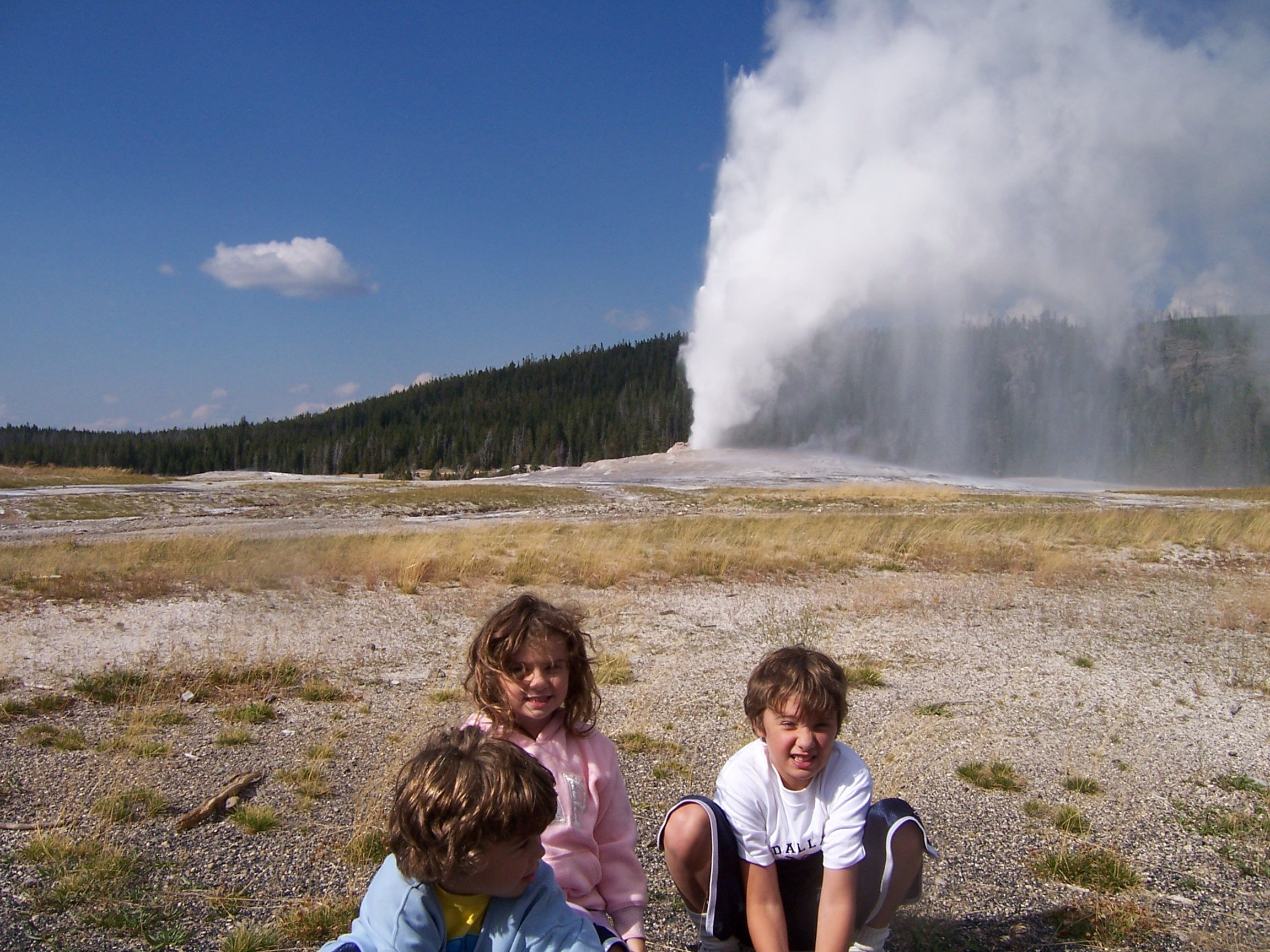 The kids and Old Faithful