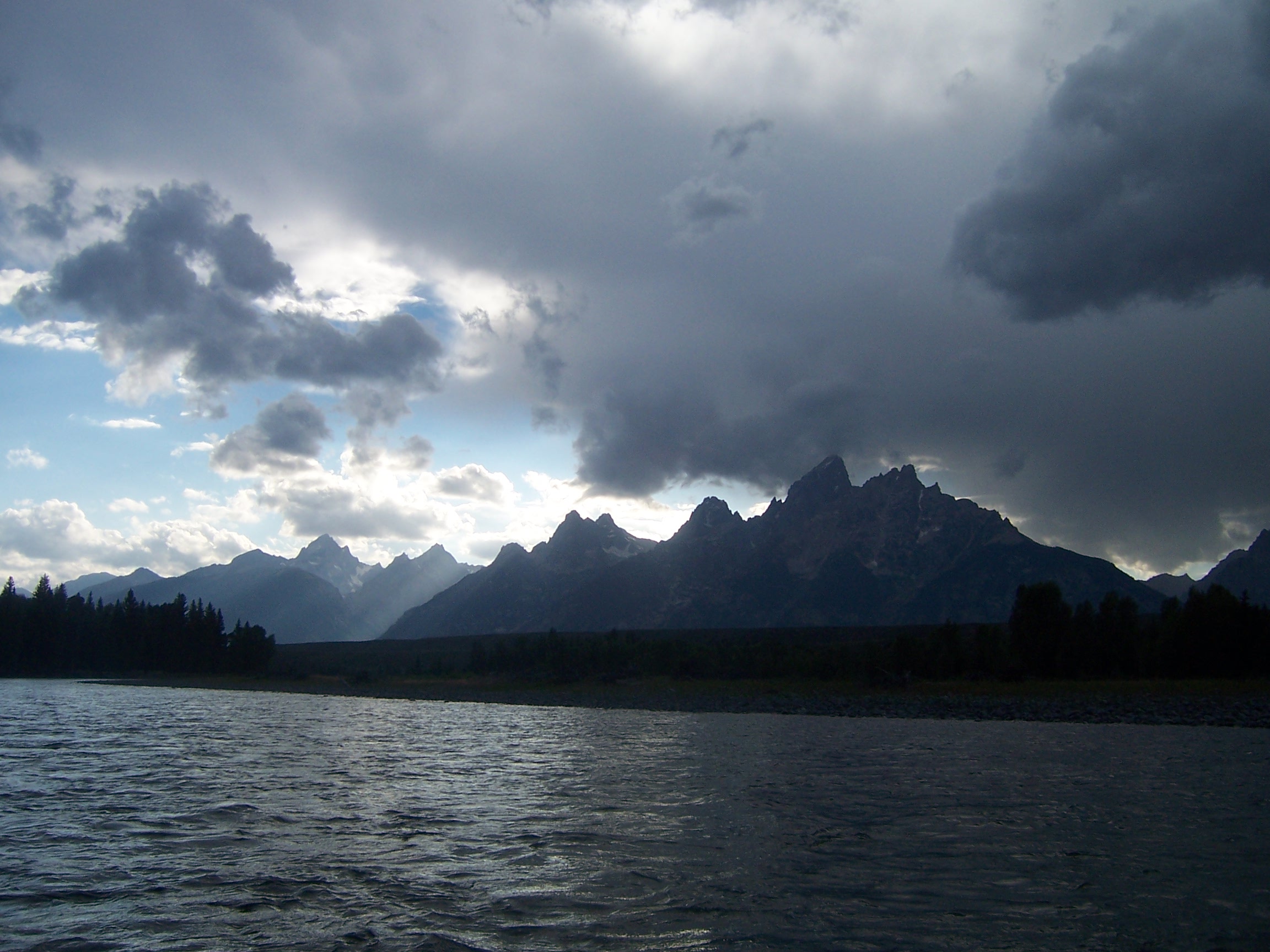 Grand Teton Range from Snake River. Bad weather is starting to brew.