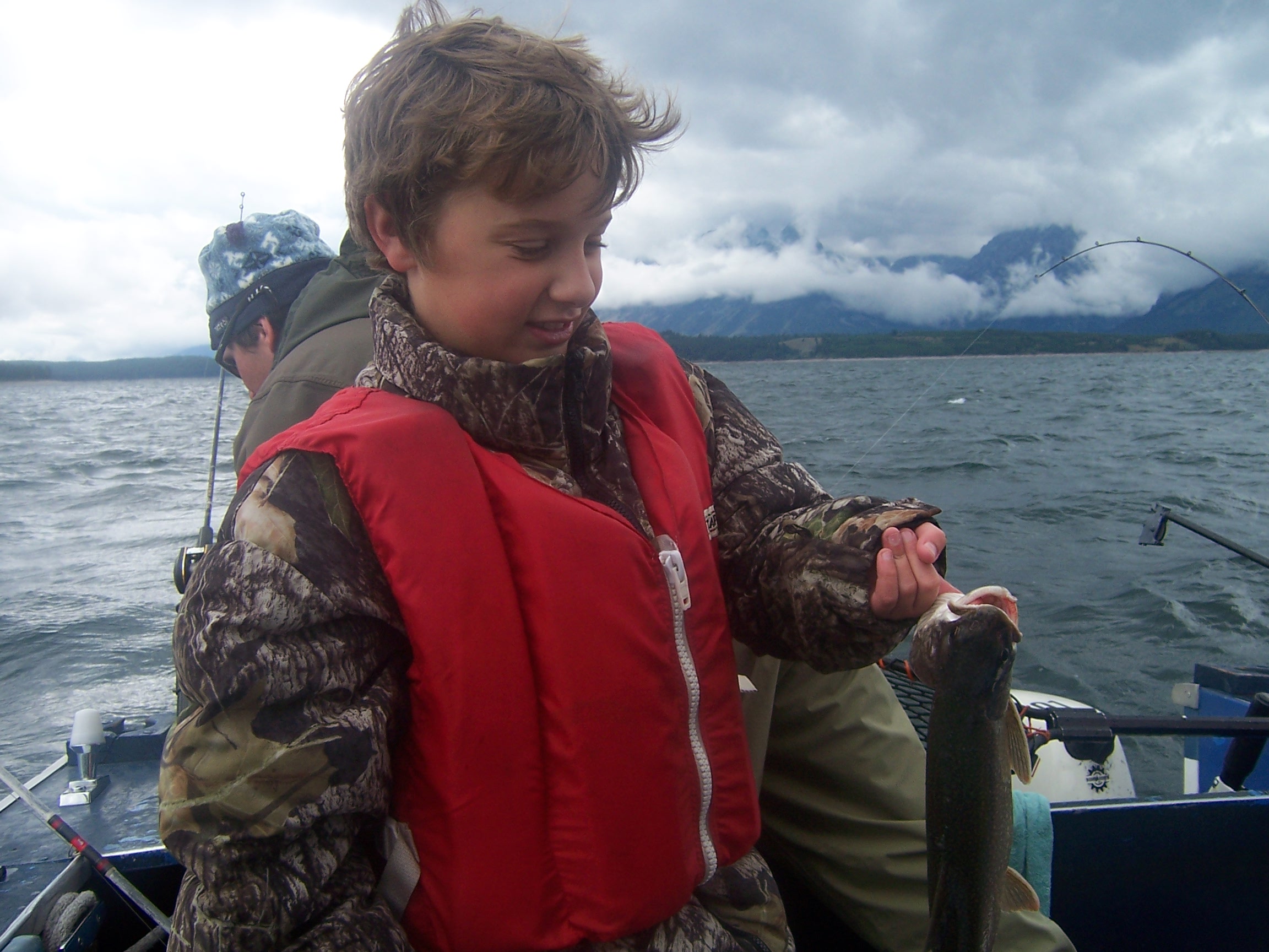 Jacob got a fish on Jackson Lake.