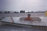 Jacob in boat on the beach