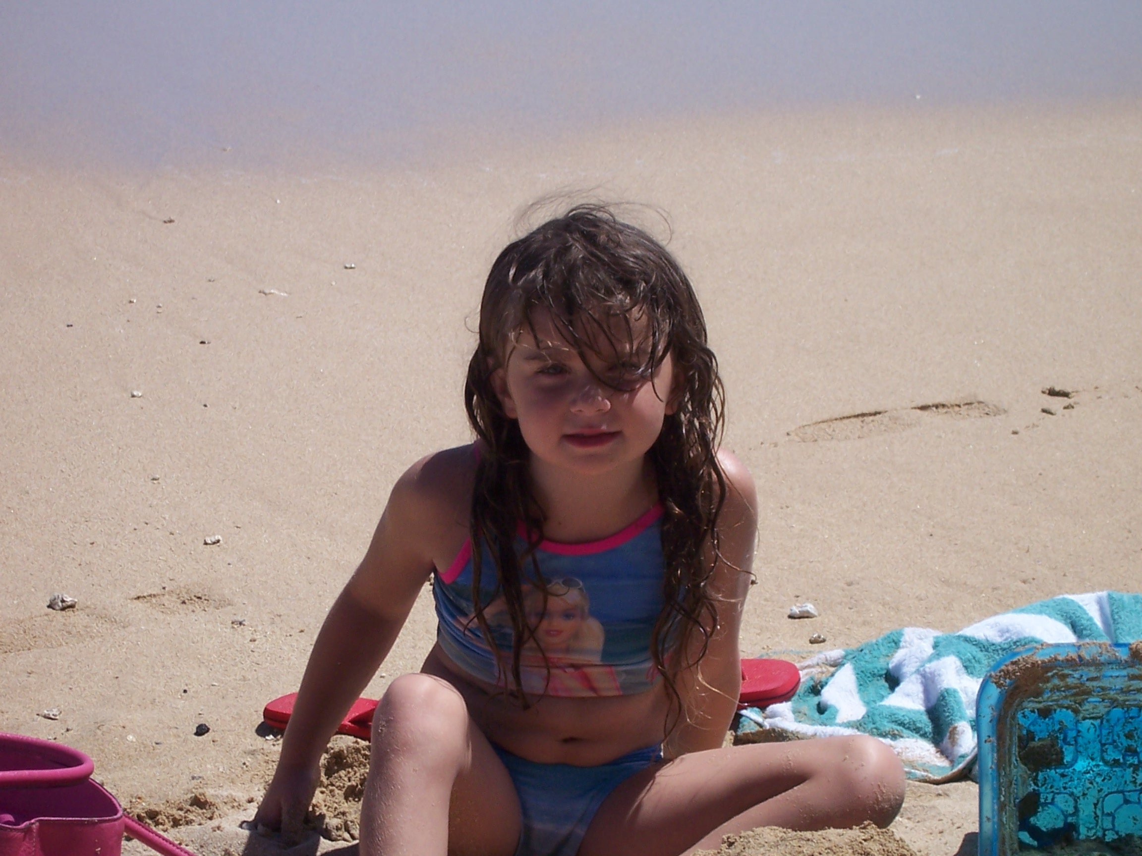 Rachel playing in the sand.