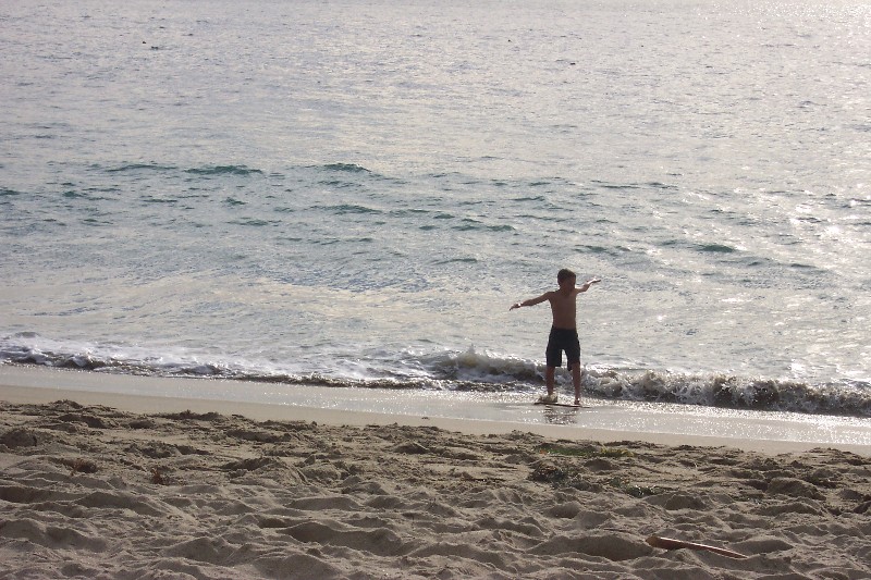 Jacob tried to surf the waves at Laguna Beach, he had some success