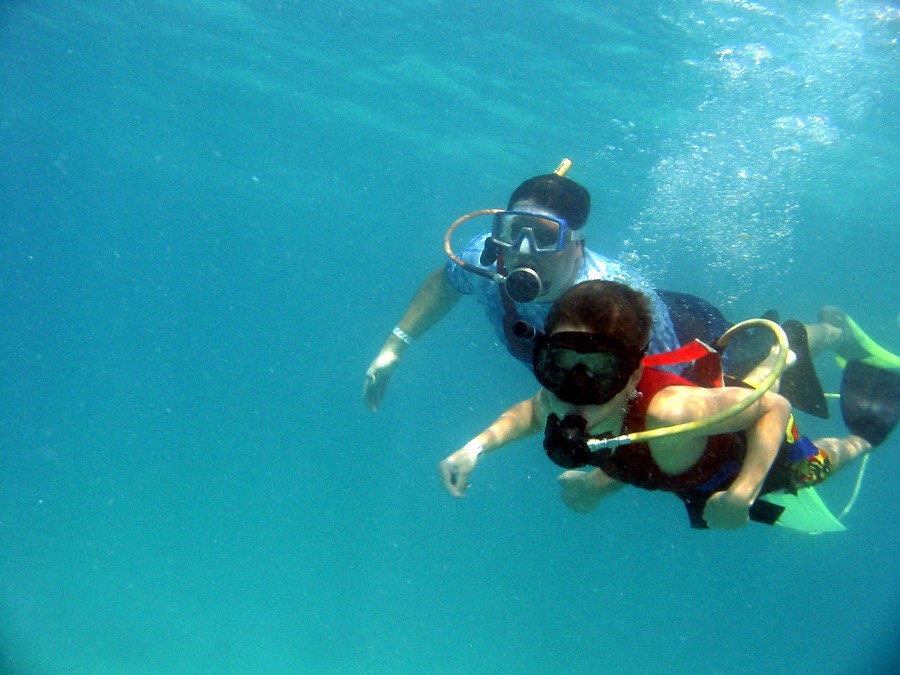 Jacob and I went Snuba diving. Snuba means that you go under water but you don't use a tank, you use a hose attached to a floating tank