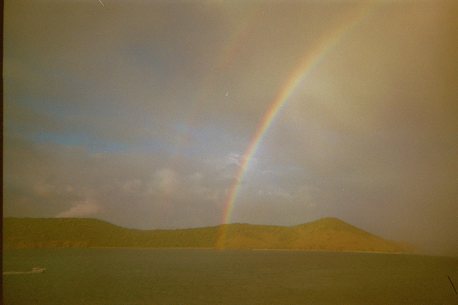 Rainbow over Thatch Cay a small uninhabited Island by St. Thomas