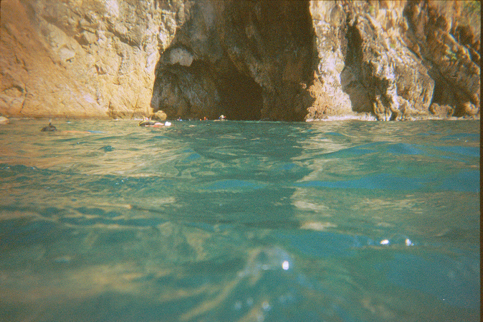 During our cruise we went snorkling in several places. Here we are snorkling around and in a Cave