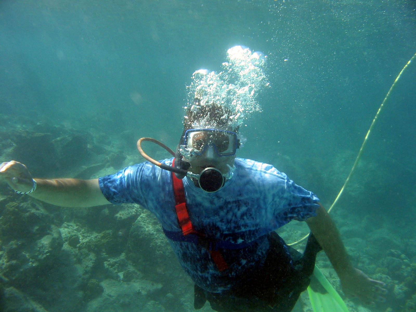 Jacob and I went Snuba diving. Snuba means that you go under water but you don't use a tank, you use a hose attached to a floating tank