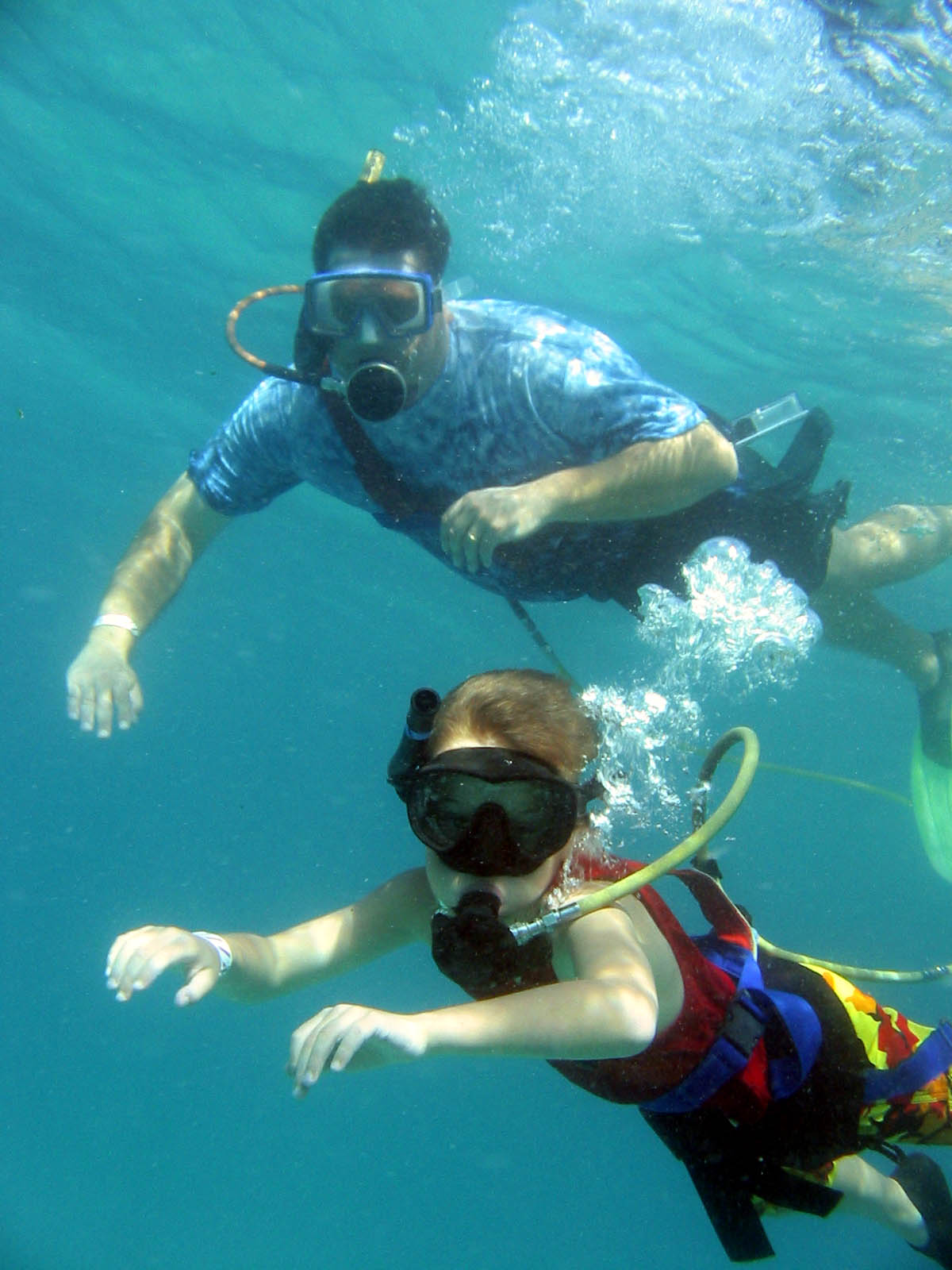 Jacob and I went Snuba diving. Snuba means that you go under water but you don't use a tank, you use a hose attached to a floating tank