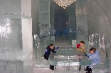 Our Kids around the Ice Table in the lobby. Clock-wise from left Jacob, David, and Rachel