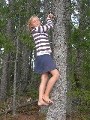 Maria climbing a tree