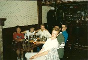 Around the table. Viviann (red), Arlene, Anders, Jonas (front), Lilip not visible, Per (blue)