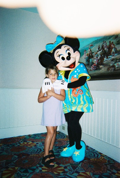 Minnie Mouse gives Sara Van Newkirk a hug