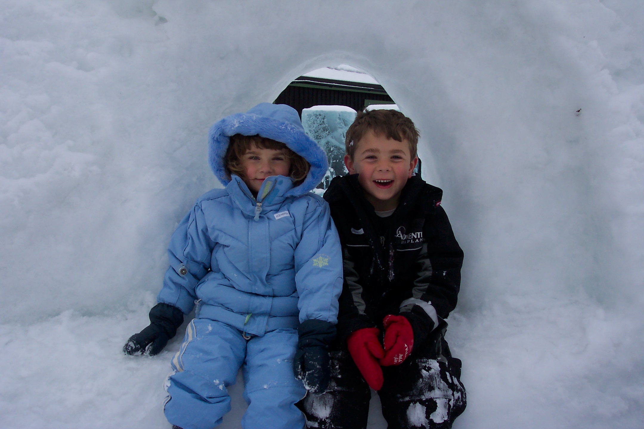 Rachel and David in Ice Hotel Window (two of our kids)